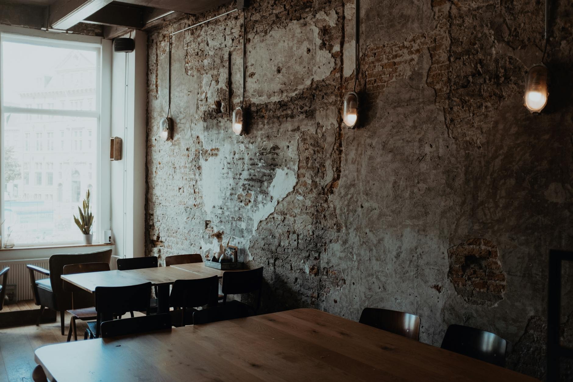 Photographer capturing interior architectural details with professional equipment
